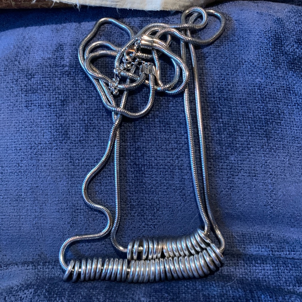 Modern 19 Silvertone Necklace With Disks 10$
